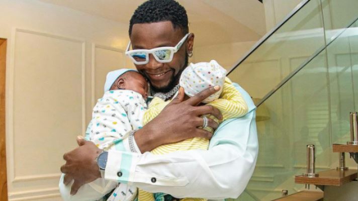 Kizz Daniel Gifts His newly born Twins a House Each