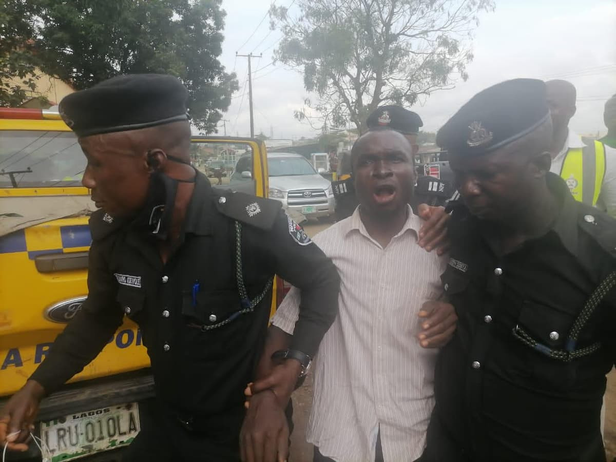 Man attempts jumping down from a mast in Iyana Ipaja Lagos