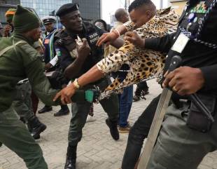 Police Arrest #EndSARS Protester “Wearing Charms” At Lagos Lekki Tollgate (Video)