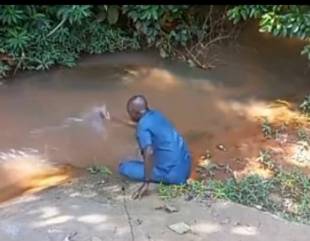 Man Prays Against Evil Nigerian Leaders, Takes Case To His Village Stream (Video)