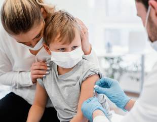 Young kids can now get the COVID vaccine. Will schools require it?