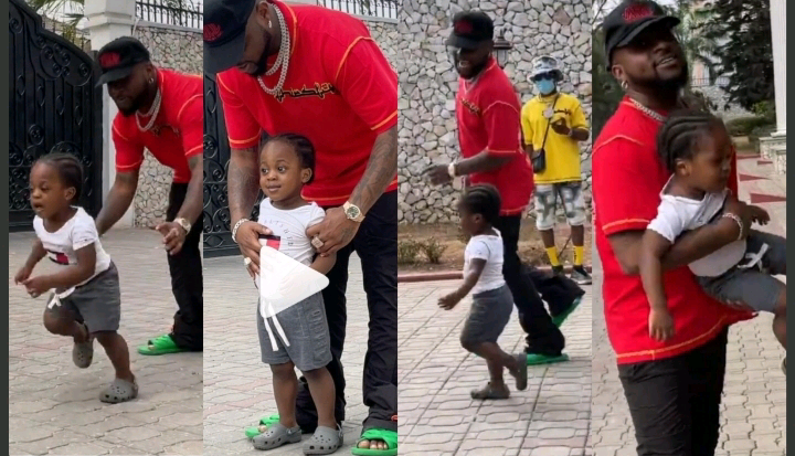 Watch adorable video of Davido and his son, ifeanyi race together in their mansion.