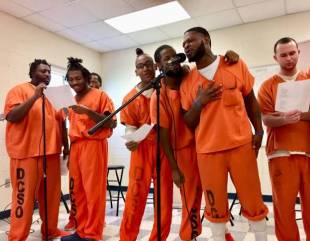 Watch How These Inmates Sing “How He Loves” With Enthusiasm.