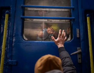 Emotional moment as little Ukrainian boy cries as his father gets set to leave for war.