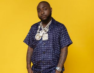 Davido flaunts newly acquired diamond teeth and Timeless gold necklace
