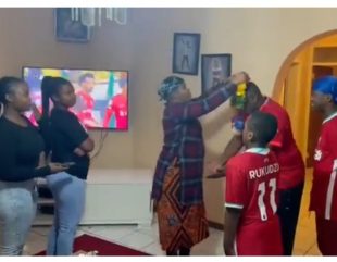 Watch as Family holds hand over ceremony with the women submitting the TV remote control to the men as the Premier League season starts (video)