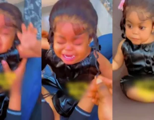 Lady receives backlashes for fixing lace wig on her baby (Video)