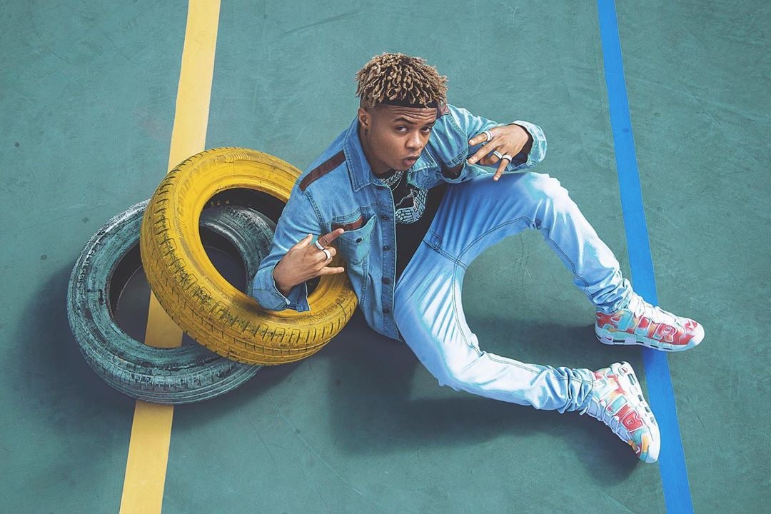 Nigerian singer, Crayon, blasted by Netizens after revealing why he hasn’t visited his parents in 5 years