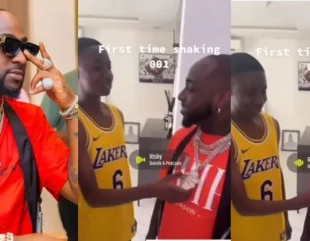 Young boy excited as Davido permits him to touch his chains (Video)