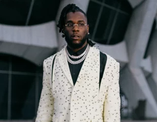 Burna Boy Surprises DJ Dope Ceaser with a Whopping 5 Million Naira Cash Gift in a Club