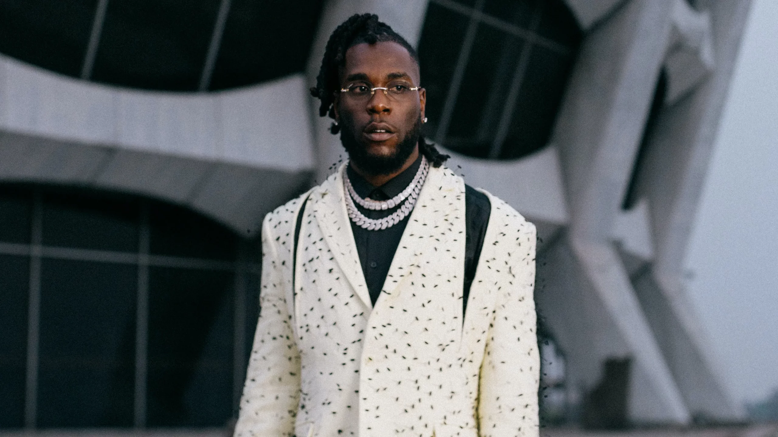 Burna Boy Surprises DJ Dope Ceaser with a Whopping 5 Million Naira Cash Gift in a Club