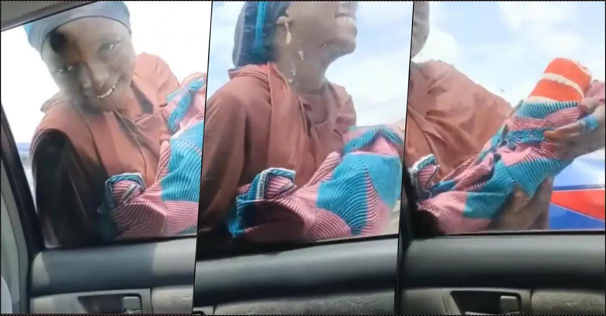 Lady spotted begging for alms with ‘fake baby’ (Video)