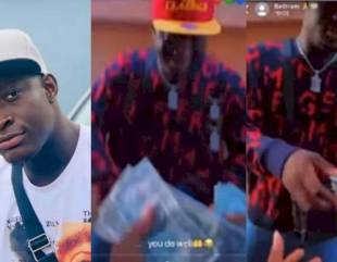 Carter Efe shares dollars as he returns from Dubai after signing multi-million naira deal (Video)