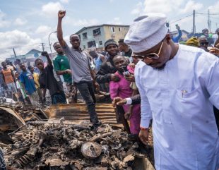 GRV, LP Governorship Candidate Visits Ajegunle After Thugs Set Ablaze Shops Belonging To Igbos (Photos)
