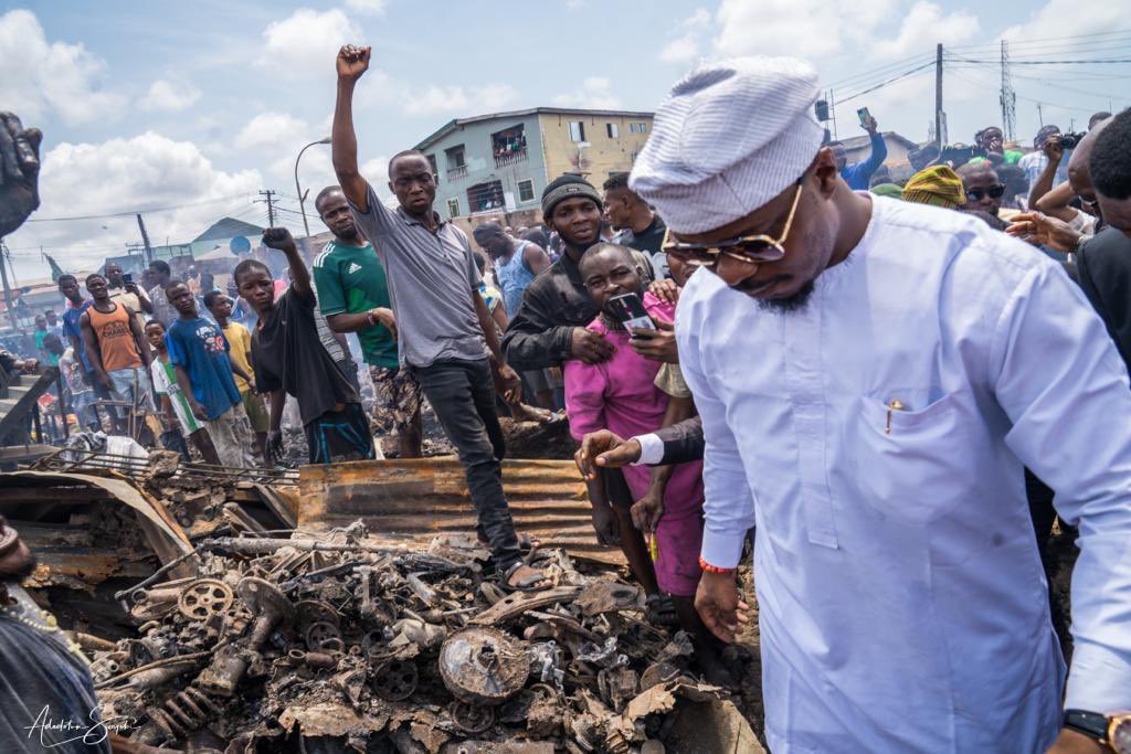 GRV, LP Governorship Candidate Visits Ajegunle After Thugs Set Ablaze Shops Belonging To Igbos (Photos)