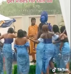 Asoebi Ladies Dance Under The Rain With Bride During Her Traditional Wedding Ceremony (Video)