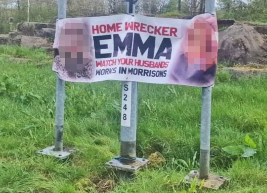 Roadside Banner Publicly Exposes ‘Home Wrecker’ with Face and Workplace on Display